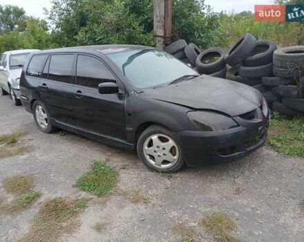 Чорний Міцубісі Lancer, об'ємом двигуна 2 л та пробігом 250 тис. км за 1850 $, фото 4 на Automoto.ua