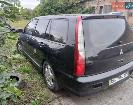 Чорний Міцубісі Lancer, об'ємом двигуна 2 л та пробігом 250 тис. км за 1850 $, фото 5 на Automoto.ua