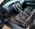 Чорний Міцубісі Lancer, об'ємом двигуна 1.6 л та пробігом 290 тис. км за 1999 $, фото 2 на Automoto.ua