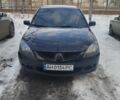 Черный Мицубиси Лансер, объемом двигателя 2 л и пробегом 231 тыс. км за 5199 $, фото 1 на Automoto.ua