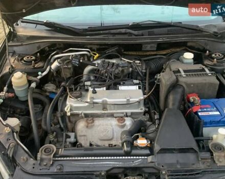 Чорний Міцубісі Lancer, об'ємом двигуна 1.6 л та пробігом 121 тис. км за 3900 $, фото 7 на Automoto.ua