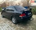 Чорний Міцубісі Lancer, об'ємом двигуна 1.6 л та пробігом 121 тис. км за 3900 $, фото 2 на Automoto.ua