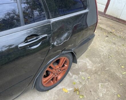 Черный Мицубиси Лансер, объемом двигателя 2 л и пробегом 175 тыс. км за 2850 $, фото 10 на Automoto.ua