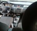 Черный Мицубиси Лансер, объемом двигателя 1.58 л и пробегом 336 тыс. км за 2600 $, фото 10 на Automoto.ua