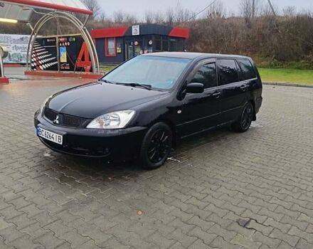 Черный Мицубиси Лансер, объемом двигателя 1.58 л и пробегом 336 тыс. км за 2600 $, фото 2 на Automoto.ua