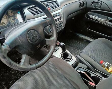 Черный Мицубиси Лансер, объемом двигателя 1.58 л и пробегом 336 тыс. км за 2600 $, фото 14 на Automoto.ua