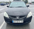 Міцубісі Lancer 2005 у Києві на Automoto.ua Чорний Міцубісі Lancer, об'ємом двигуна 1.6 л та пробігом 408 тис. км за 3900 $, фото 3 на Automoto.ua