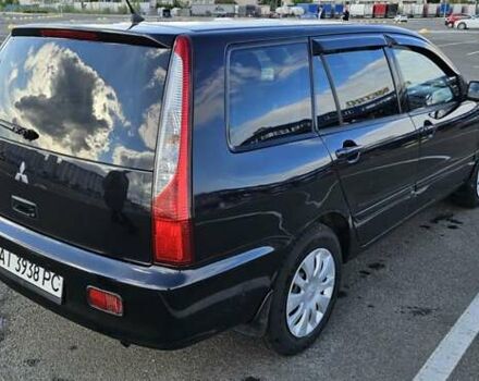 Міцубісі Lancer 2005 у Києві на Automoto.ua Чорний Міцубісі Lancer, об'ємом двигуна 1.6 л та пробігом 245 тис. км за 4000 $, фото 3 на Automoto.ua