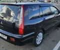 Міцубісі Lancer 2005 у Києві на Automoto.ua Чорний Міцубісі Lancer, об'ємом двигуна 1.6 л та пробігом 245 тис. км за 4000 $, фото 3 на Automoto.ua