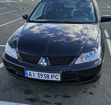 Міцубісі Lancer 2005 у Києві на Automoto.ua Чорний Міцубісі Lancer, об'ємом двигуна 1.6 л та пробігом 245 тис. км за 4000 $, фото 4 на Automoto.ua