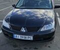 Міцубісі Lancer 2005 у Києві на Automoto.ua Чорний Міцубісі Lancer, об'ємом двигуна 1.6 л та пробігом 245 тис. км за 4000 $, фото 4 на Automoto.ua