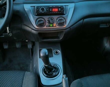 Міцубісі Lancer 2005 у Києві на Automoto.ua Чорний Міцубісі Lancer, об'ємом двигуна 1.6 л та пробігом 245 тис. км за 4000 $, фото 7 на Automoto.ua