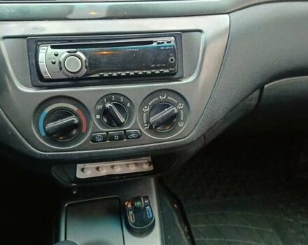 Черный Мицубиси Лансер, объемом двигателя 1.58 л и пробегом 336 тыс. км за 2600 $, фото 9 на Automoto.ua