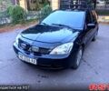 Черный Мицубиси Лансер, объемом двигателя 1.6 л и пробегом 330 тыс. км за 2250 $, фото 5 на Automoto.ua