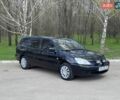 Черный Мицубиси Лансер, объемом двигателя 1.58 л и пробегом 323 тыс. км за 2999 $, фото 1 на Automoto.ua