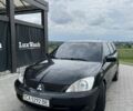 Чорний Міцубісі Lancer, об'ємом двигуна 1.6 л та пробігом 340 тис. км за 3500 $, фото 1 на Automoto.ua