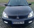 Мицубиси Лансер 2006 в Киеве на Automoto.ua Черный Мицубиси Лансер, объемом двигателя 1.58 л и пробегом 296 тыс. км за 4500 $, фото 9 на Automoto.ua