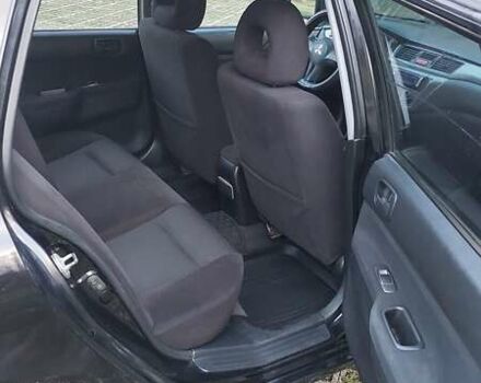 Мицубиси Лансер 2006 в Киеве на Automoto.ua Черный Мицубиси Лансер, объемом двигателя 1.58 л и пробегом 296 тыс. км за 4500 $, фото 18 на Automoto.ua