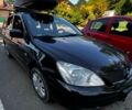 Чорний Міцубісі Lancer, об'ємом двигуна 1.6 л та пробігом 290 тис. км за 3500 $, фото 1 на Automoto.ua