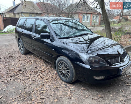 Чорний Міцубісі Lancer, об'ємом двигуна 1.6 л та пробігом 220 тис. км за 5500 $, фото 1 на Automoto.ua