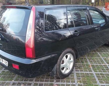 Мицубиси Лансер 2006 в Киеве на Automoto.ua Черный Мицубиси Лансер, объемом двигателя 1.58 л и пробегом 296 тыс. км за 4500 $, фото 23 на Automoto.ua