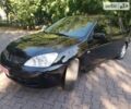 Чорний Міцубісі Lancer, об'ємом двигуна 1.6 л та пробігом 252 тис. км за 4900 $, фото 16 на Automoto.ua