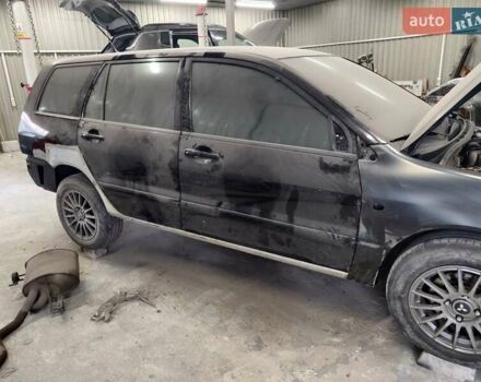 Чорний Міцубісі Lancer, об'ємом двигуна 1.6 л та пробігом 220 тис. км за 5500 $, фото 16 на Automoto.ua