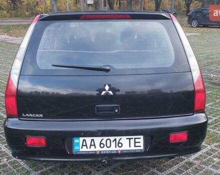 Мицубиси Лансер 2006 в Киеве на Automoto.ua Черный Мицубиси Лансер, объемом двигателя 1.58 л и пробегом 296 тыс. км за 4500 $, фото 14 на Automoto.ua