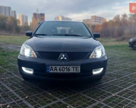 Мицубиси Лансер 2006 в Киеве на Automoto.ua Черный Мицубиси Лансер, объемом двигателя 1.58 л и пробегом 296 тыс. км за 4500 $, фото 8 на Automoto.ua