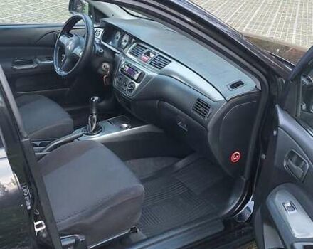 Мицубиси Лансер 2006 в Киеве на Automoto.ua Черный Мицубиси Лансер, объемом двигателя 1.58 л и пробегом 296 тыс. км за 4500 $, фото 17 на Automoto.ua