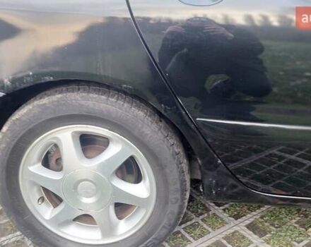 Мицубиси Лансер 2006 в Киеве на Automoto.ua Черный Мицубиси Лансер, объемом двигателя 1.58 л и пробегом 296 тыс. км за 4500 $, фото 26 на Automoto.ua