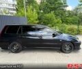Черный Мицубиси Лансер, объемом двигателя 2 л и пробегом 226 тыс. км за 5000 $, фото 4 на Automoto.ua