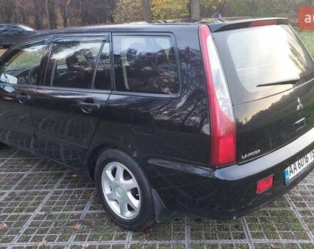 Мицубиси Лансер 2006 в Киеве на Automoto.ua Черный Мицубиси Лансер, объемом двигателя 1.58 л и пробегом 296 тыс. км за 4500 $, фото 24 на Automoto.ua