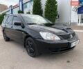 Черный Мицубиси Лансер, объемом двигателя 1.58 л и пробегом 226 тыс. км за 3400 $, фото 1 на Automoto.ua