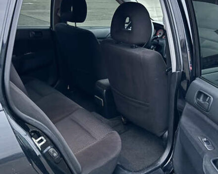 Чорний Міцубісі Lancer, об'ємом двигуна 1.58 л та пробігом 260 тис. км за 3299 $, фото 32 на Automoto.ua