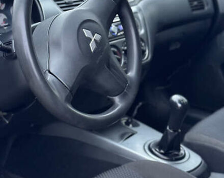 Чорний Міцубісі Lancer, об'ємом двигуна 1.58 л та пробігом 260 тис. км за 3299 $, фото 11 на Automoto.ua