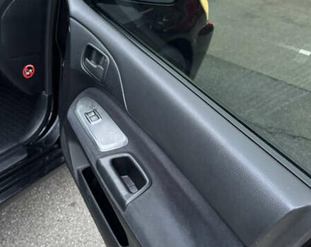 Чорний Міцубісі Lancer, об'ємом двигуна 1.58 л та пробігом 260 тис. км за 3299 $, фото 30 на Automoto.ua