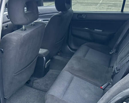 Чорний Міцубісі Lancer, об'ємом двигуна 1.58 л та пробігом 260 тис. км за 3299 $, фото 17 на Automoto.ua