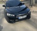 Черный Мицубиси Лансер, объемом двигателя 2 л и пробегом 2 тыс. км за 7000 $, фото 1 на Automoto.ua