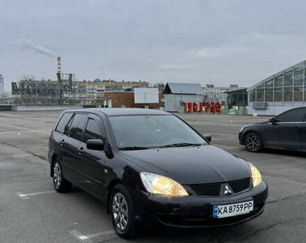 Чорний Міцубісі Lancer, об'ємом двигуна 1.58 л та пробігом 260 тис. км за 3299 $, фото 1 на Automoto.ua