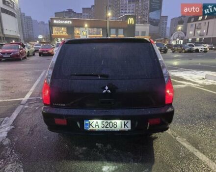 Чорний Міцубісі Lancer, об'ємом двигуна 1.6 л та пробігом 180 тис. км за 4100 $, фото 6 на Automoto.ua