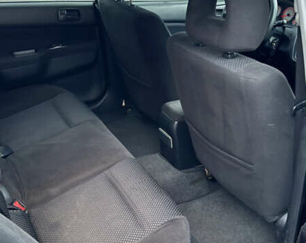 Чорний Міцубісі Lancer, об'ємом двигуна 1.58 л та пробігом 260 тис. км за 3299 $, фото 33 на Automoto.ua