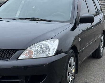 Чорний Міцубісі Lancer, об'ємом двигуна 1.58 л та пробігом 260 тис. км за 3299 $, фото 2 на Automoto.ua