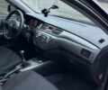 Чорний Міцубісі Lancer, об'ємом двигуна 1.58 л та пробігом 260 тис. км за 3299 $, фото 31 на Automoto.ua