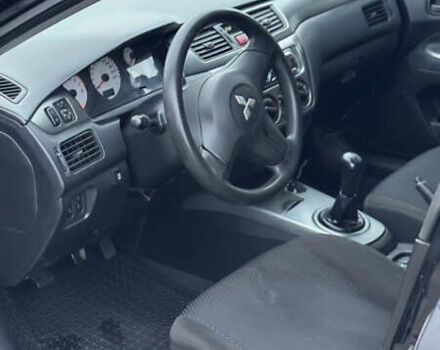 Чорний Міцубісі Lancer, об'ємом двигуна 1.58 л та пробігом 260 тис. км за 3299 $, фото 10 на Automoto.ua