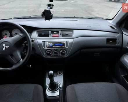 Чорний Міцубісі Lancer, об'ємом двигуна 1.58 л та пробігом 260 тис. км за 3299 $, фото 20 на Automoto.ua