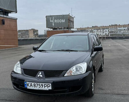Чорний Міцубісі Lancer, об'ємом двигуна 1.58 л та пробігом 260 тис. км за 3299 $, фото 4 на Automoto.ua