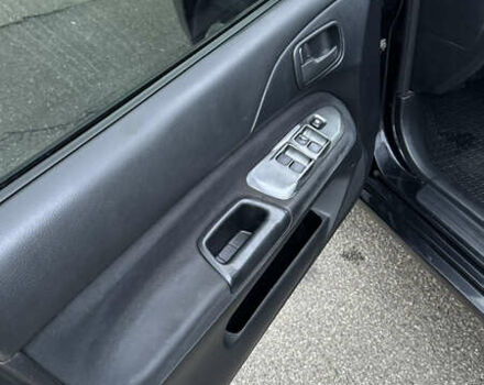 Чорний Міцубісі Lancer, об'ємом двигуна 1.58 л та пробігом 260 тис. км за 3299 $, фото 12 на Automoto.ua