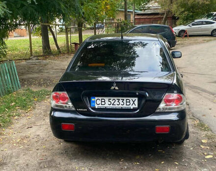 Чорний Міцубісі Lancer, об'ємом двигуна 1.58 л та пробігом 240 тис. км за 4000 $, фото 2 на Automoto.ua