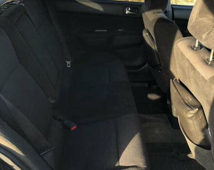 Чорний Міцубісі Lancer, об'ємом двигуна 1.58 л та пробігом 206 тис. км за 2900 $, фото 7 на Automoto.ua